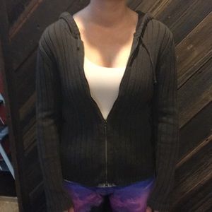 A brown zip up sweater